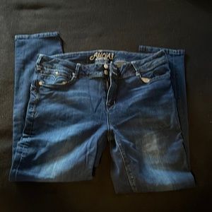 Dark blue stretchy skinny jeans.